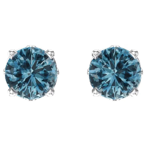 14 Karat White Gold Blue Topaz Earrings